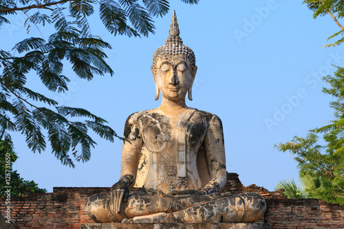 Fototapeta Ancient buddha. Sukhothai Historical Park or Old Sukhothai City.