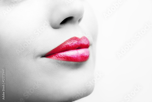 Plump sexy lips and perfect skin on a white background