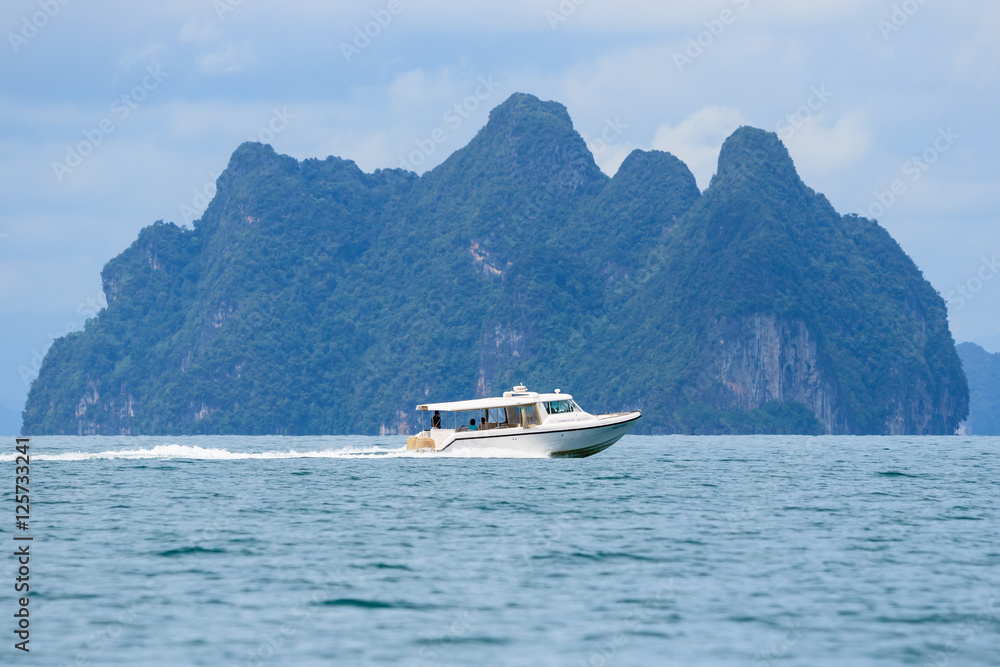 Boat and small island near Koh Yao noi island, Phang Nga, THAILA