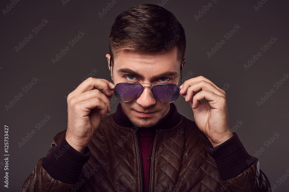 Obraz premium Fashion portrait of young handsome man