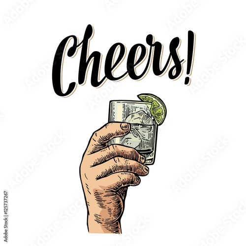 Male hand holding a glass with gin, lemon and ice cubes.