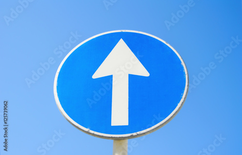 Traffic sign post go straight with blue sky background