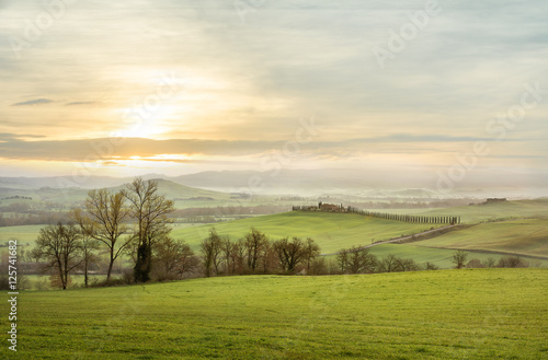 Panoramic view of valley Val D'Orcia on sunrise. Tuscany, Italy