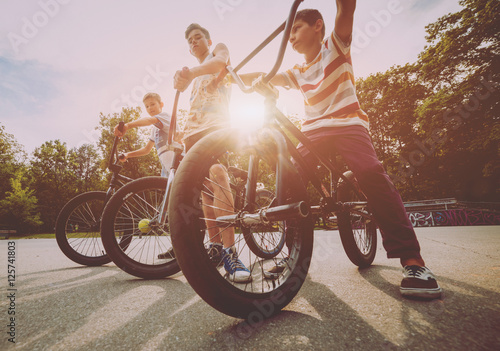 Company of young people on BMX