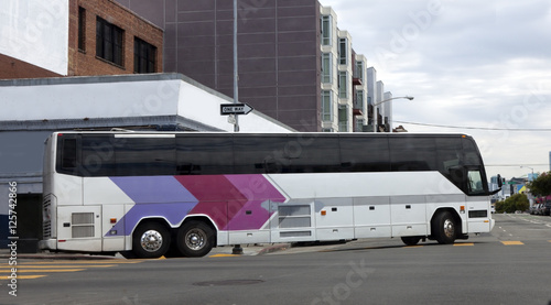 Tour Bus Making Turn at Intersection