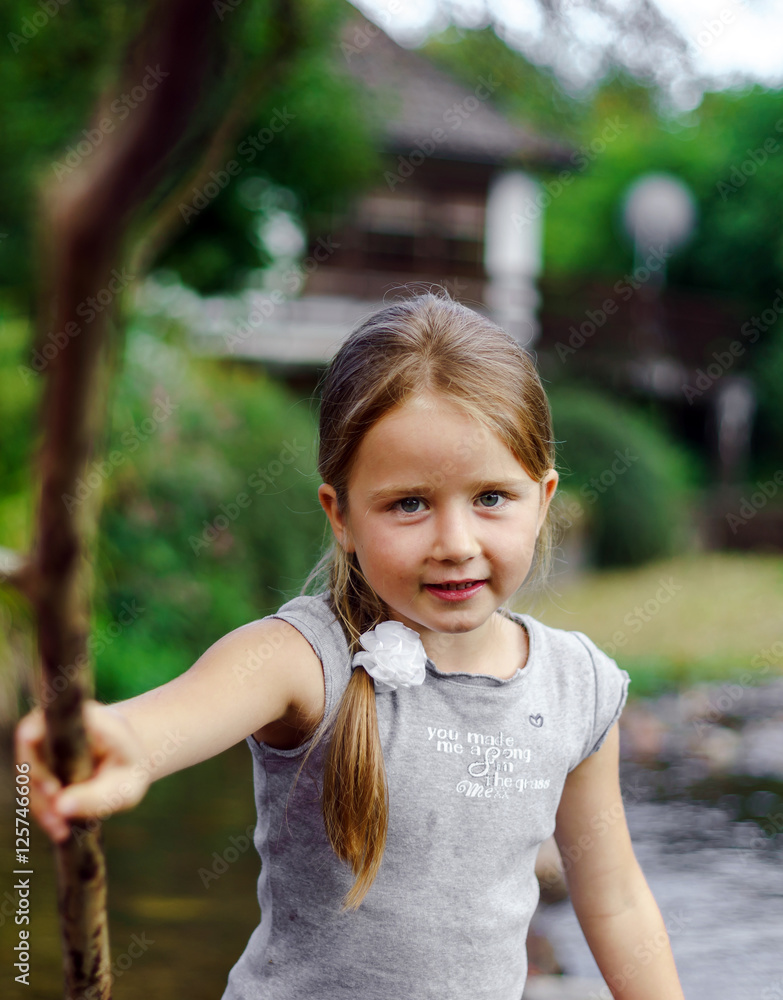 Cute little girl outdoor portrait on the river Cute little girl outdoor portrait on the river