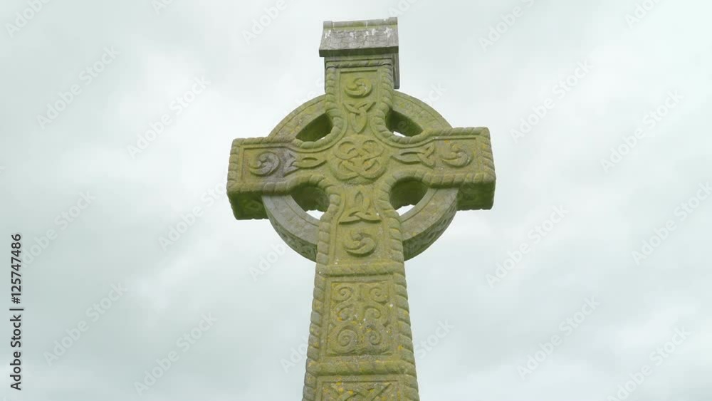 The mosses on the high cross outside the Rock of Cashel. The Rock of Cashel also known as Cashel of the Kings and St. Patricks Rock is a historic site located at Cashel County Tipperary Ireland. The mosses on the high cross outside the Rock of Cashel. The Rock of Cashel also known as Cashel of the Kings and St. Patricks Rock is a historic site located at Cashel County Tipperary Ireland.
