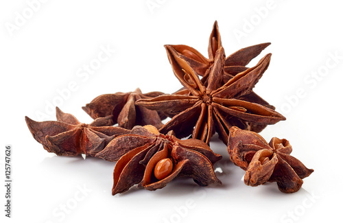 Heap of star anise isolated on white