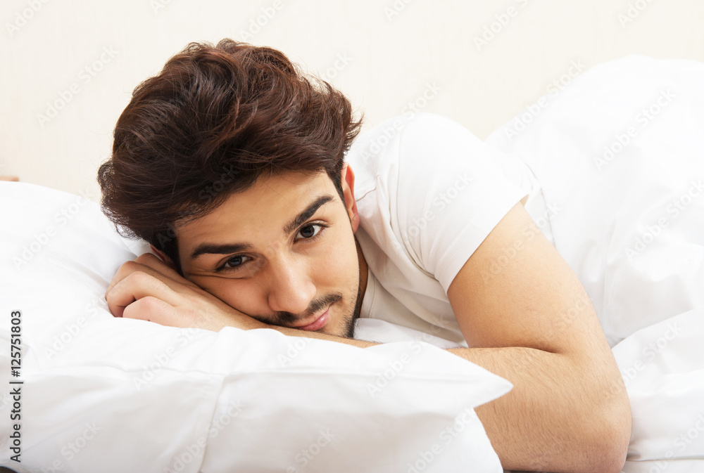Man lying on the bed Man lying on the bed