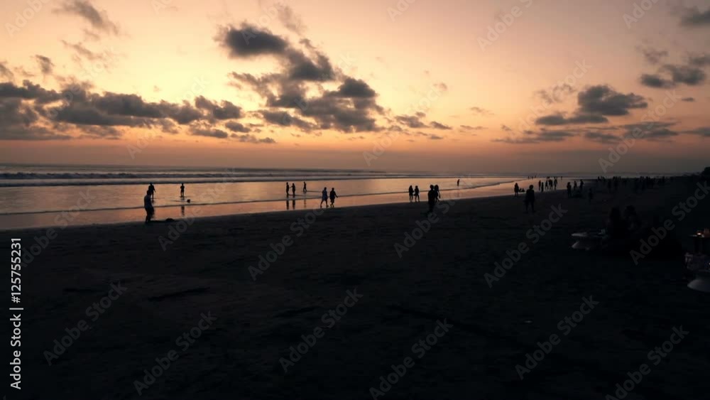 People relaxing on beach during sunset, super slow motion 120fps
People relaxing on beach during sunset, super slow motion 120fps