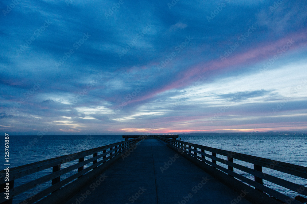 Fototapeta premium Sunrise over pier