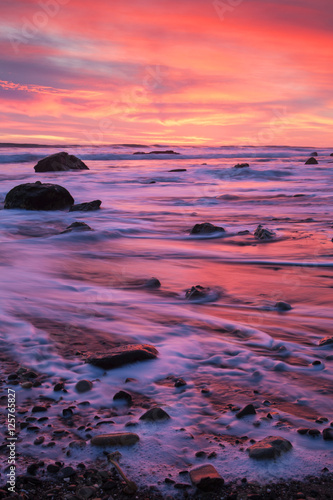 winter storms erode the sandy beach ar Arroyo Burro, or Hendry's Beach, in Santa Barbara, California photo