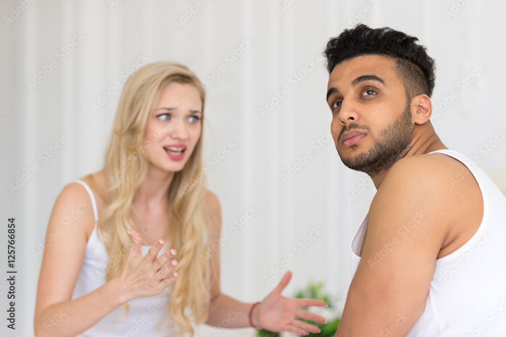 Young Couple Lying In Bed, Having Conflict Relationships Problem, Sad Negative Emotions Unhappy Hispanic Man And Woman Lovers In Bedroom Young Couple Lying In Bed, Having Conflict Relationships Problem, Sad Negative Emotions Unhappy Hispanic Man And Woman Lovers In Bedroom