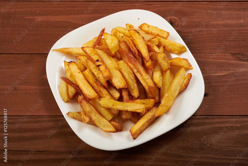 fried French fries on a plate fried French fries on a plate