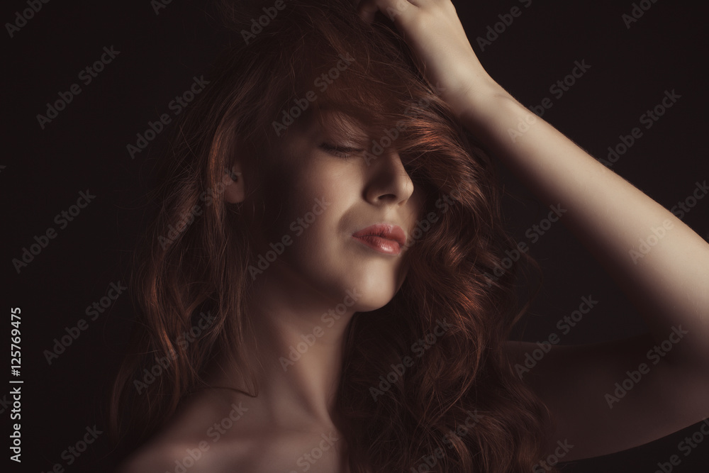 Closeup portrait of sensual woman with closed eyes Closeup portrait of sensual woman with closed eyes