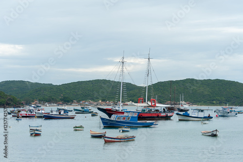Boats big and small anchored at bay in Buzios, Rio de Janeiro, B