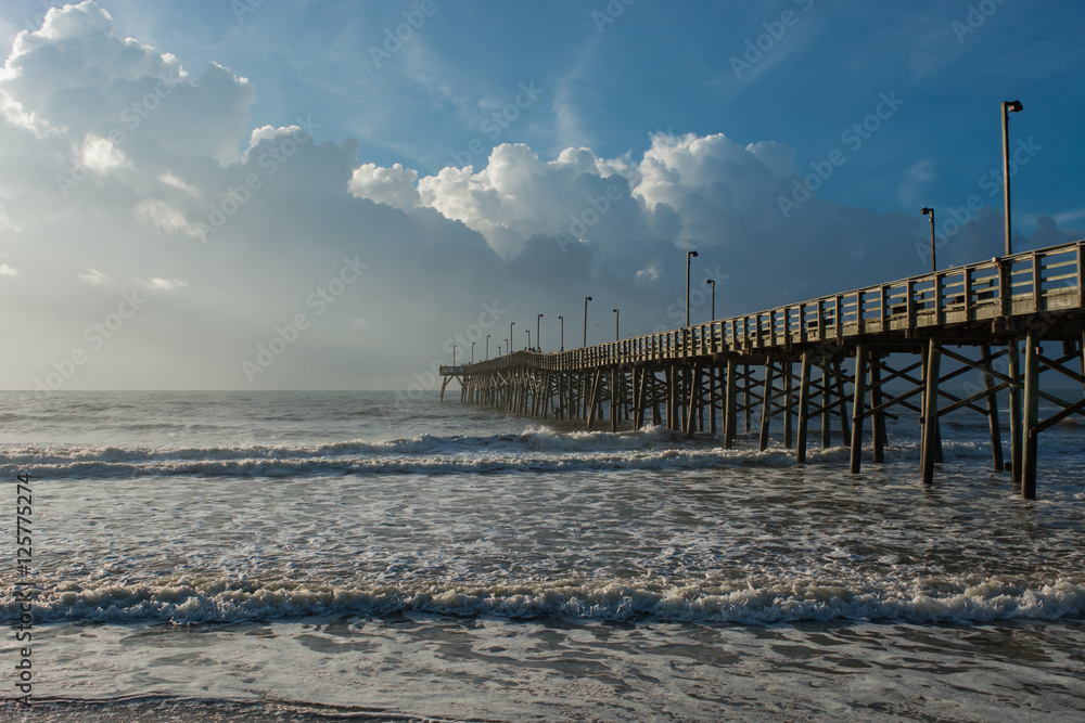 Obraz premium Ocean pier. Beach scene. Topsail Island, North Carolina. 