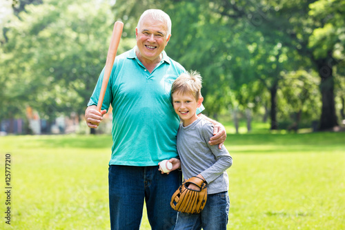 Wall Mural Grandson And Grandfather Playing Baseball