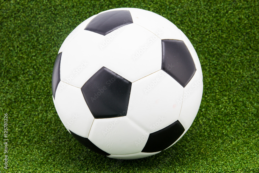 Fototapeta premium soccer ball on soccer field