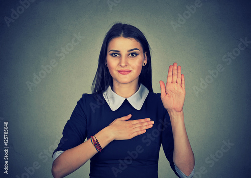 Quadro em tela Young woman making a promise