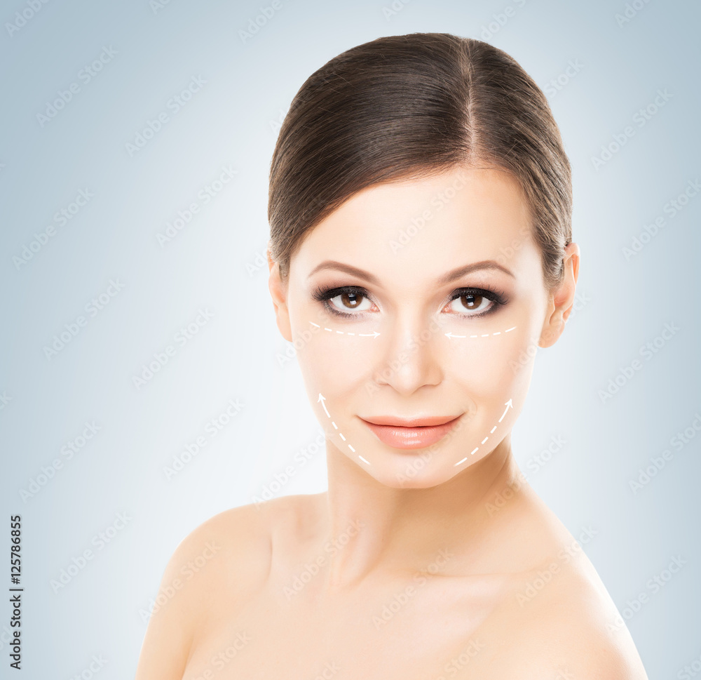 Portrait of a young woman with arrows on her face Portrait of a young woman with arrows on her face
