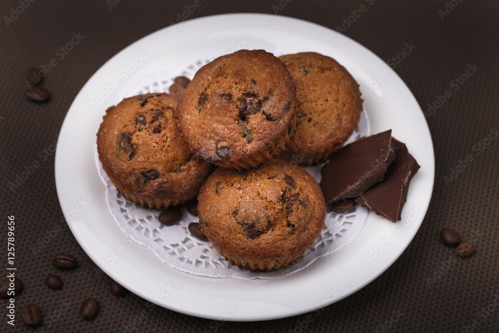 Muffins with chocolate filling home-cooked, closeup Muffins with chocolate filling home-cooked, closeup