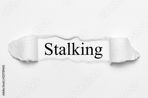 Stalking on white torn paper photo