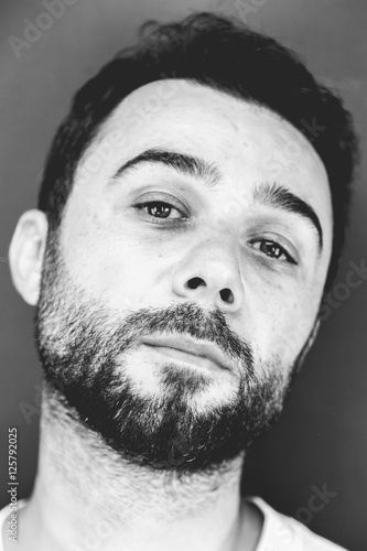 Young handsome man with beard studio portrait