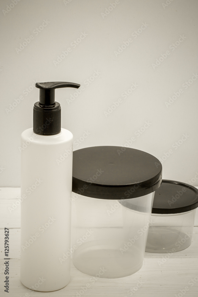 Obraz premium Jars for cosmetics on a white background