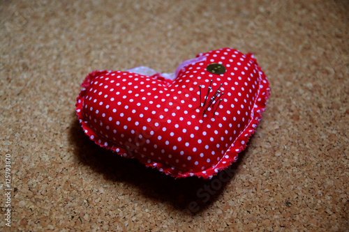 Pillow for brooches in heart shape photo