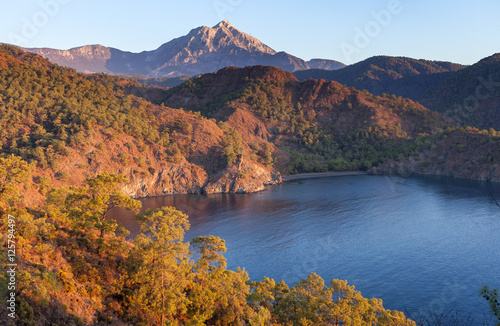 Turkish landscape with Olympos mountain, beach and green forest