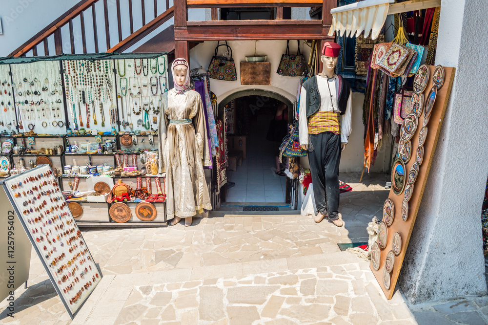 Traditional clothes. Bazaar in Mostar, Bosnia and Herzegovina. Stock Photo  | Adobe Stock