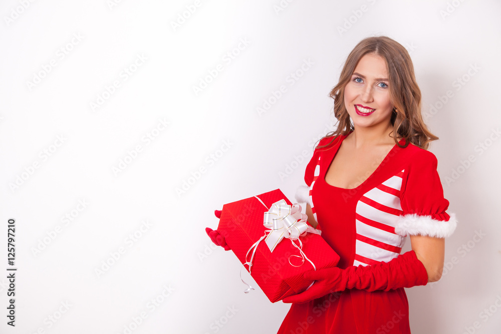 Beautiful happy girl in Santa Claus clothes Beautiful happy girl in Santa Claus clothes
