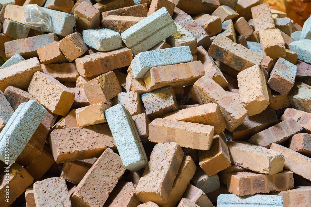 Heap of orange brick blocks, Brick blocks material for construction, Scatteredly of brick blocks heap, Non assembled brick blocks Heap of orange brick blocks, Brick blocks material for construction, Scatteredly of brick blocks heap, Non assembled brick blocks