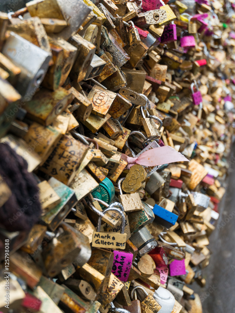 Love Padlocks at Pont de l'Archevche in Paris. The thousands of locks of loving couples symbolize love forever.