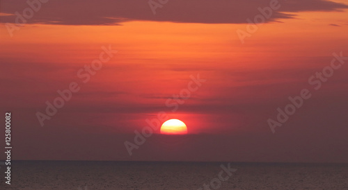 The sunset sun goes down over the Indian Ocean © anna_purna