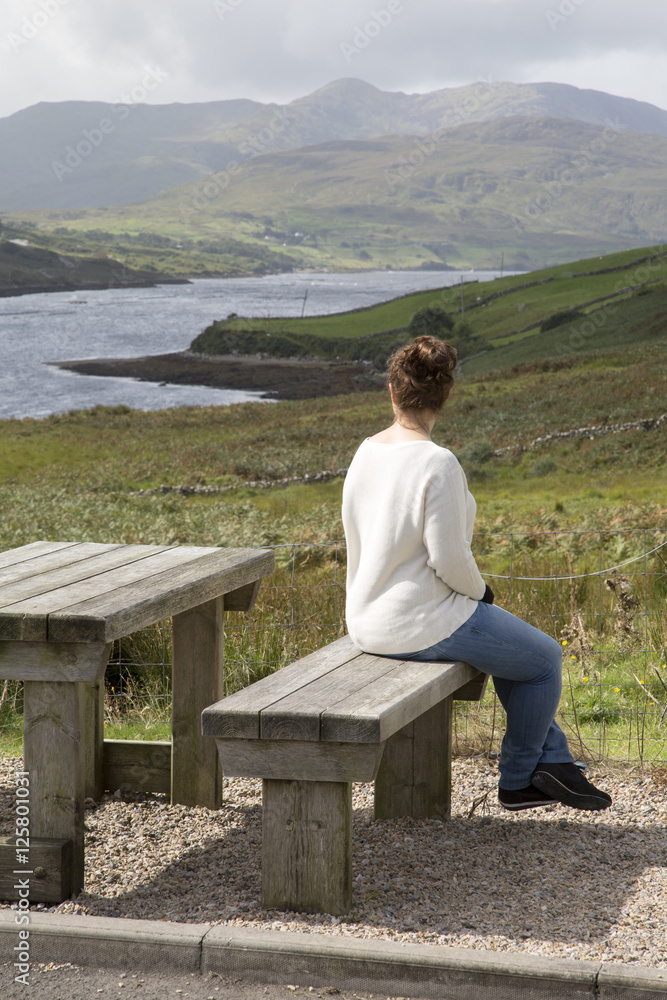 Young Woman looking at Killary Fjord Lake; Leenane, Connemara