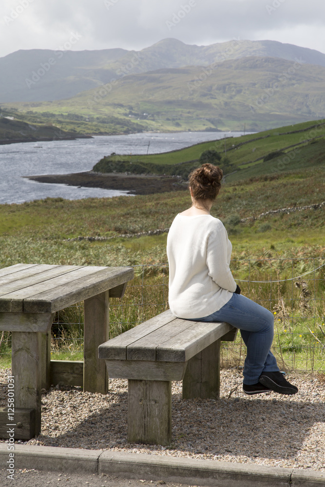 Young Woman looking at Killary Fjord Lake; Leenane, Connemara Young Woman looking at Killary Fjord Lake; Leenane, Connemara