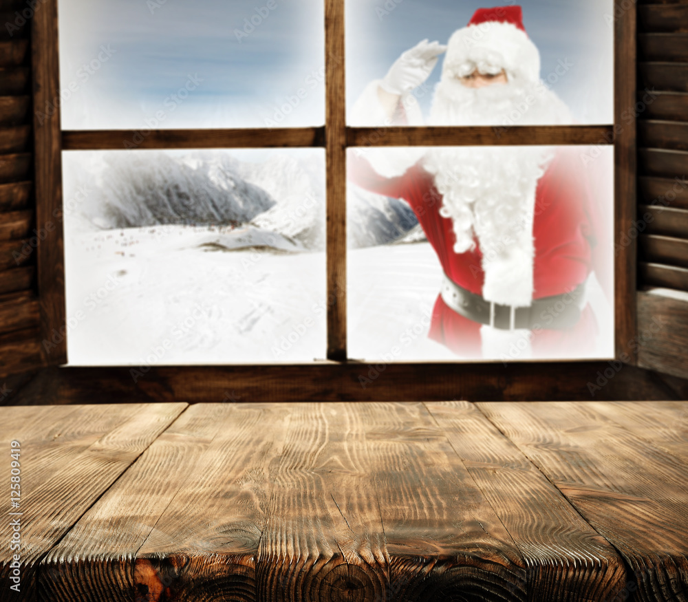 Obraz premium wooden desk space and santa claus 