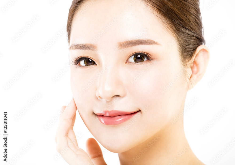 closeup young woman face isolated on white closeup young woman face isolated on white