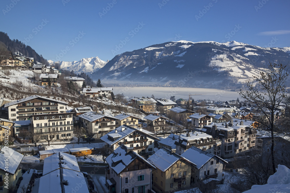 Zell am See town over the Zell lake and Alps
