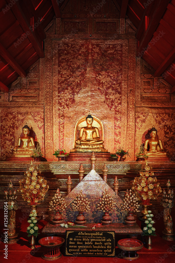 Buddha statue an important and very old Wat Phra-singh Temple Chiang Mai Thailand.