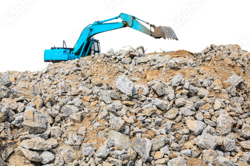 pieces of concrete and brick rubble debris on construction site with loader on white background