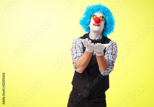 portrait of a clown sending a kiss