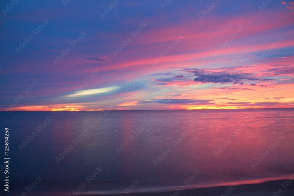 Sunrise and beach. Morning at sea beautiful, Sky colorful and water sea at reflex.
