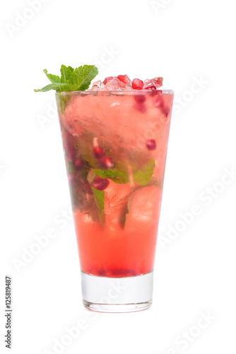drink with pomegranate seeds and mint ice on white background