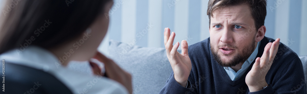 Fototapeta premium Confused young man