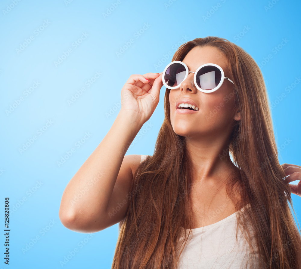portrait of a pretty girl wearing a round sunglasses portrait of a pretty girl wearing a round sunglasses