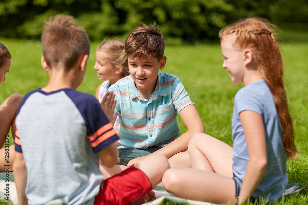 happy kids playing rock-paper-scissors game happy kids playing rock-paper-scissors game