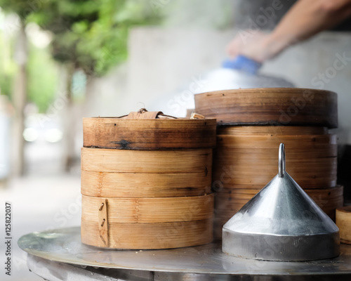 close up dim sum in bamboo steamer,yumcha of chinese cuisine wit photo